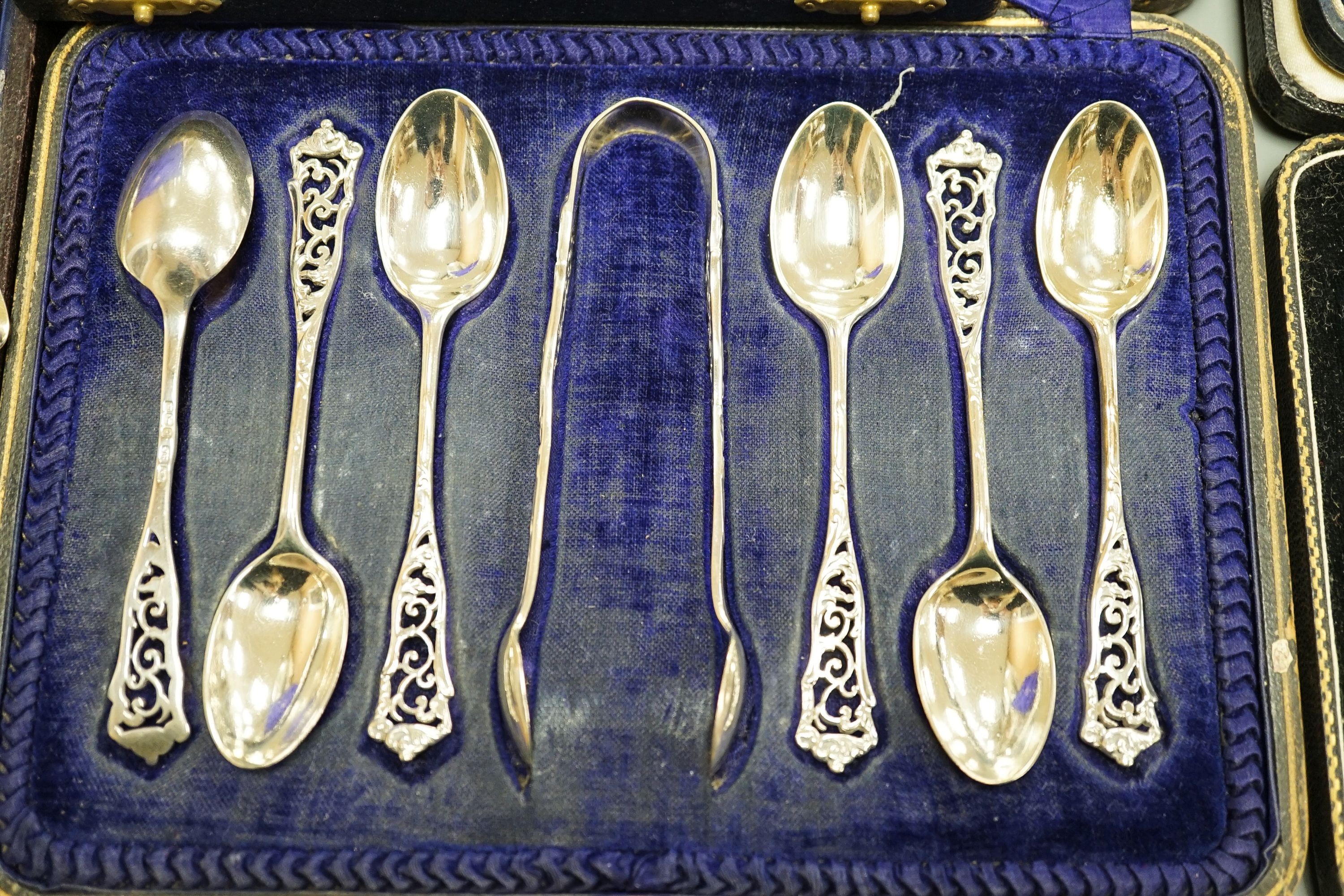 Seven assorted cased sets of English silver tea and coffee spoons, including a set of twelve silver gilt teaspoons, London, 1882 (one set incomplete).